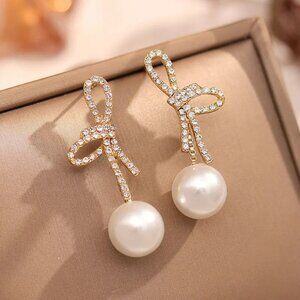 2/$24 Elegant Bow Pearl Drop Earrings With Rhinestone Accents Gold-Tone Finish